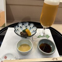 やま中 オリエンタルホテル福岡 博多ステーション店 - お通し。オレンジのはかぼちゃだと思います。