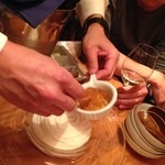 浪花ろばた 頂鯛 - ポン酢のジュレをかけます。