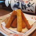 Fried long pieces with spices