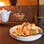 ホンのジカン - 料理写真:・季節のタルト桃850円・チャイ850円　今シーズン食べた中で個人的1番美味しかった桃タルト。最終日にリピ出来て嬉しかった♪