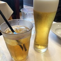 トラットリア グランボッカ - セットのアイスティとセット外の生ビール