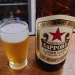 大衆酒場 馬越 - 瓶ビール赤星（大瓶）　550円