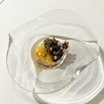 ウシマル - 炭火で焼いたタコ足と野菜