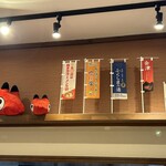 會津・喜多方らーめん 愛絆 - 店内の赤べこ