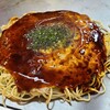 OKAMOTO'S Okonomiyaki - 肉玉そば(税込990円)
                ・茹で生中太麺(山本食品)
                ・オタフクソース(フルーティーな甘み)
                ・焼き方:ヘラで押さえる
                ・焼き上がりの形:円形の焼き上がり
                ・鉄板で食べる