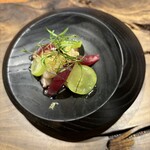 ル クーリュズ - 炭焼きの蛸(日間賀)酢橘ドレッシング、シャインマスカット、フィンガーライム、赤玉葱