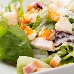 Caesar salad with thick-sliced bacon and soft-boiled eggs