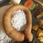 インド料理 パリワル - ほんのり甘くてモチモチなセルロティは、お米を水につけて細かくするところから作っているとのこと