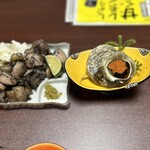 望洋館 - 地鶏炭火焼き　サザエの壺焼き。
