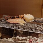 温石 - 伊勢海老を炭火で