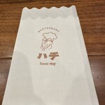 ハチ - かわいい紙ナプキン。紙エプロンも全席、配布されています。