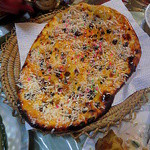 サプナ - カシミリナン（ココナッツロング、レーズン、チョコスプレーを散らしたスイーツナン）