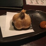 三代目網元 魚鮮水産 - にんにく丸揚げ