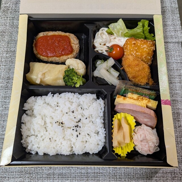 丸長 長谷川調理部 - 旭川四条（弁当）の写真