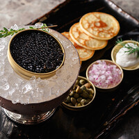 Caviar With Cocktail Blinis