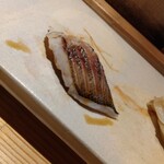 268799538 - 包丁をスッと入れてあります。