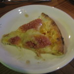 カナイシ - カットされたピザ