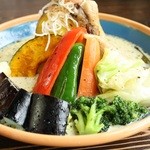 Green curry with bone-in chicken and plenty of vegetables