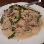 オステリア ピテカントロポ - 豚肉とインゲンのリゾット
