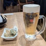 肉汁水餃子 餃包 - お通し　330円　＆　生ビール　715円