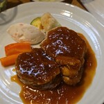 キッチン ブルー グローブ - 豚肩ロースポシェのアップ