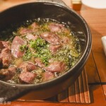 肉惣菜 徳 - 砂肝のアヒージョ