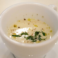 EX marunouchi - 魚介のパエリアコース 2970円 のポタージュ