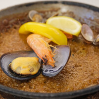 EX marunouchi - 魚介のパエリアコース 2970円 の魚介のパエリア
