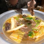 水炊き吟醸もつ鍋 由乃 - クレソンがいい仕事してます