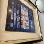 カレーの店 ボンベイ - 早川義孝画伯の絵画(たぶん)が飾られている