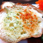 ゴメンネJIRO - （前菜）ガーリックトースト。