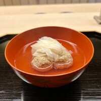 道人 - 鶉のつくねと金沢 源助だいこん 奥井海生堂 蔵囲 利尻昆布と血合抜き鮪節の出汁椀 白葱を乗せて