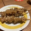 新時代 - 伝串（鶏皮を揚げて甘辛味をつけたもの）1串55円