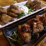 沖縄ぬ隠れ家 NI-NI - 手間 沖縄島ラー油の鷄の唐揚げ 680円
      奥     南海のさめの唐揚げ 580円