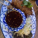 タイ・イサーン料理ヤムヤム - ムーピン880円　豚の串焼き