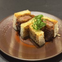 煌 焼肉 - 北海道つべつ和牛のカメノコを熊本産生姜の煌特製醤油ポンドバター使用のプレミアムカツサンド