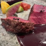 274598456 - ジビエらしさを表現。黒いのはアイヌ語で「シケレペ」をのせて。