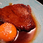 くろぎ - 卵黄のやわらかな口どけと、割り下の締まった味わいで引き立つ身の味わい。