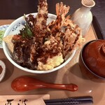 天ぷら 兎波 - 味噌天丼(竹)トッピング卵の天ぷら
薄衣のサクサク天ぷらが美味しかったです♪
味噌も濃すぎず新しい天ぷらの食べ方を知りました
お味噌も美味しかったです♪