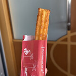 ベイサイド・テイクアウト - クリームブリュレ風チュロス　カリカリとちょっともちもち　中に甘いクリーム入っていて美味しくてインディージョーンズで気持ち悪くなった胃が生き返る