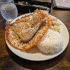 Cafe ジビエ工業 - ジューシーチキンレッグのバリバリチーズ羽つきプレート