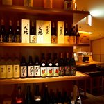 みちのく - お酒がずらりと飾られています。