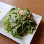 BiOsteria Komakine - 本日の一品 (水菜のサラダ)