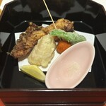 日本料理 隨縁亭 - 唐揚げはアラを使ってるのか、ちょっと食べにくい…フグの白子は口の中で弾けてとろけました。