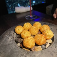 Restaurant Bellustar - アミューズの一品目歯シューです。胡麻、山椒、七味、七味が効きます。