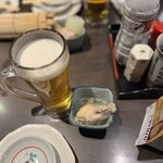 たくみ - お通し　手羽元と大根の煮物
