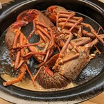 水の - 包丁で半分にして焼いていきます