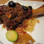 レスフェル - 骨付き仔羊すね肉とレモンコンフィのチュニジュア風煮込み　オリーブとアーモンドの香り