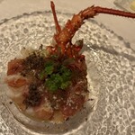 ジャンティーユ - ◉ 前菜①
      伊勢海老と生ハム、冬野菜のフリカッセ
      トリュフ添え