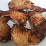 かねふく - 手羽先も明太子の調味液で漬けています